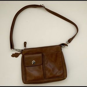 Brown leather roots purse/bag in excellent shape